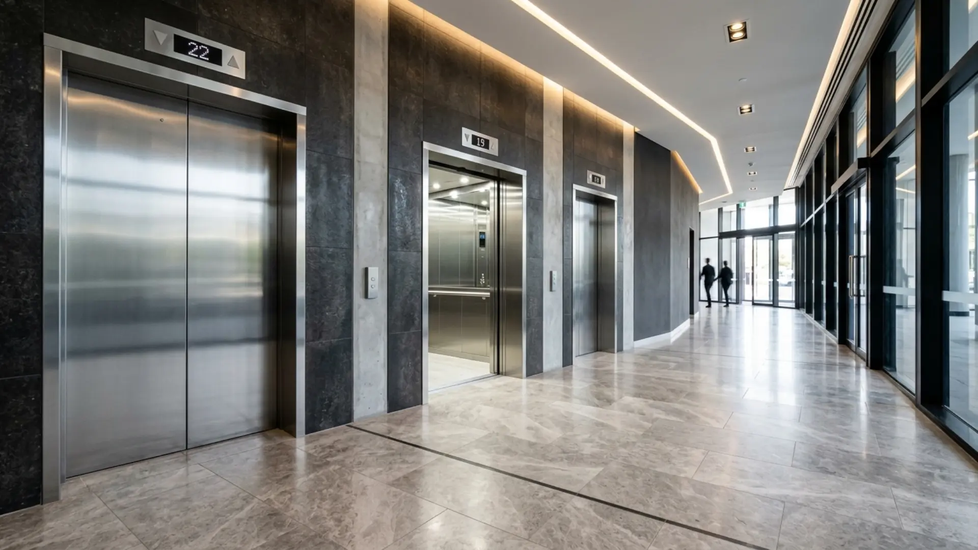 Commercial lift lobby with stainless steel doors in an Australian office building