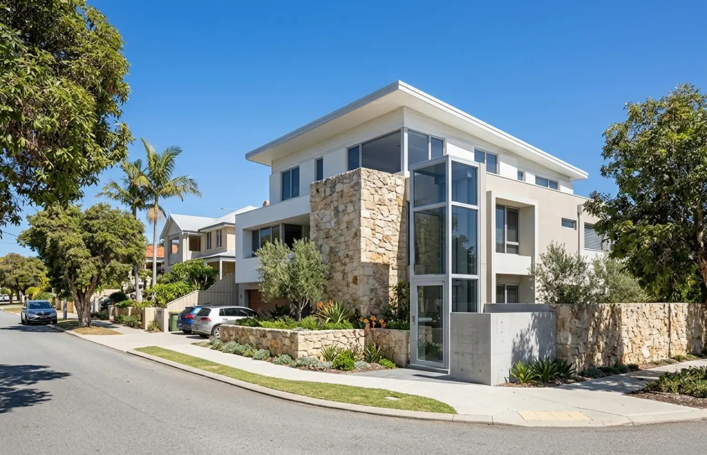 Contemporary two-storey homes with limestone walls in a Perth coastal suburb